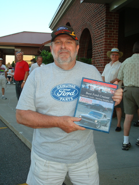 Dan Szlaga enjoys his Best Ford prize.