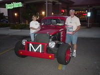 Jerry Mattson wins the State Farm Outstanding Cruiser plaque for his cool 39 Plymouth hot rod.