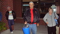 Don & Betty Kostrach win the raffle bucket of car cleaning goodies.