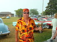 Chuck Hamann wins an Outstanding Trophy