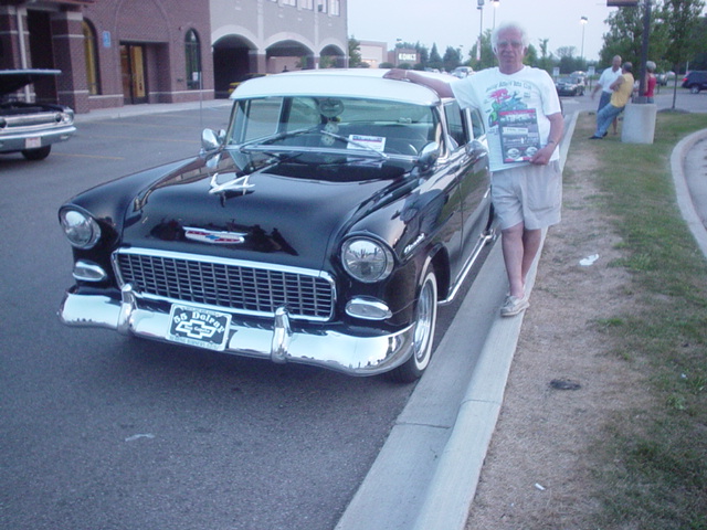 Don Caputo shows his SnS Cruizers Choice plaque for his classic 55 DelRay.