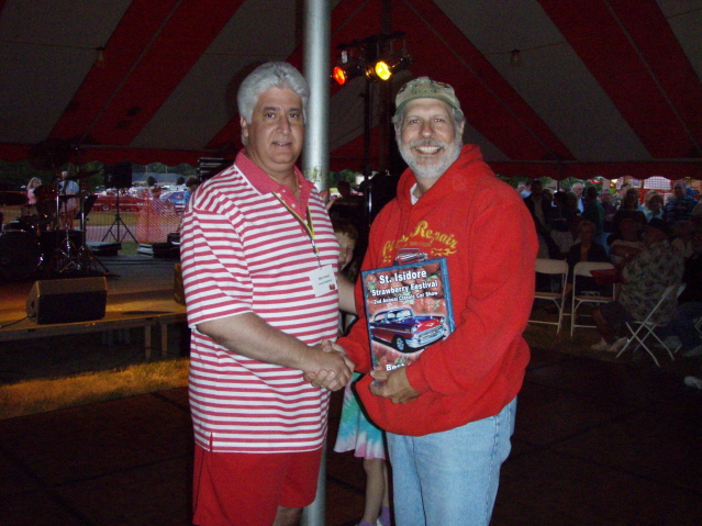 SI's Mike Fontana presents Bert Bernardi his Class award for his sweet 36 Ford