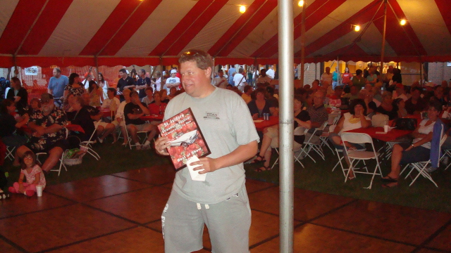 Jim Mueller wins his award for his amazing 1955 Chevy 210.