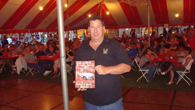 Dwaye Hrynyk  wins his award for his beautiful 1981 Trans Am.