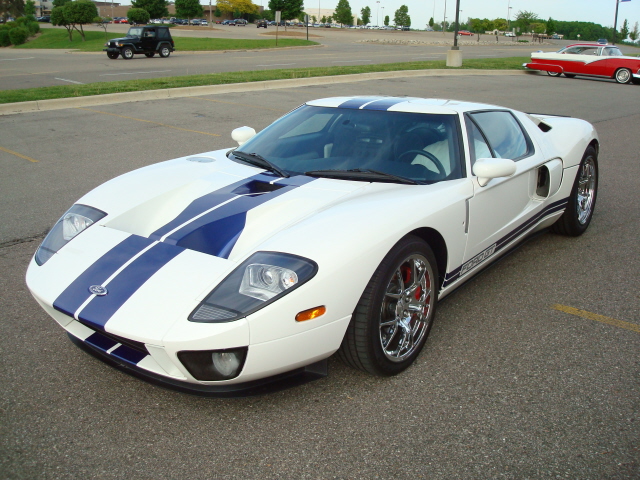 A sleak beauty sneaks in at the end of the cruise-in.