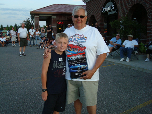 Ken Orlowski gets the Best Muscle Car plaque