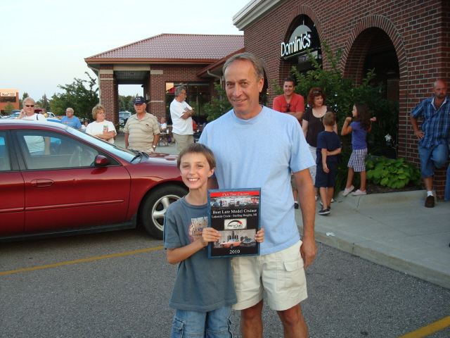 John DeFilippo smiles with his Rev Up Best Late Model cruiser award.